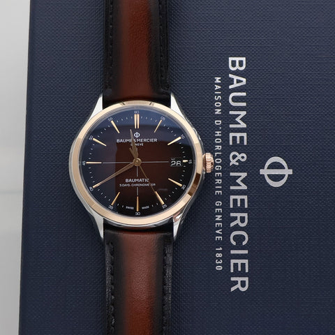 Baume & Mercier Clifton Baumatic COSC Automatic Stainless Steel & Rose Gold Brown Dial Brown Leather Strap Date Mens Watch M0A10713 - Watches & Beyond